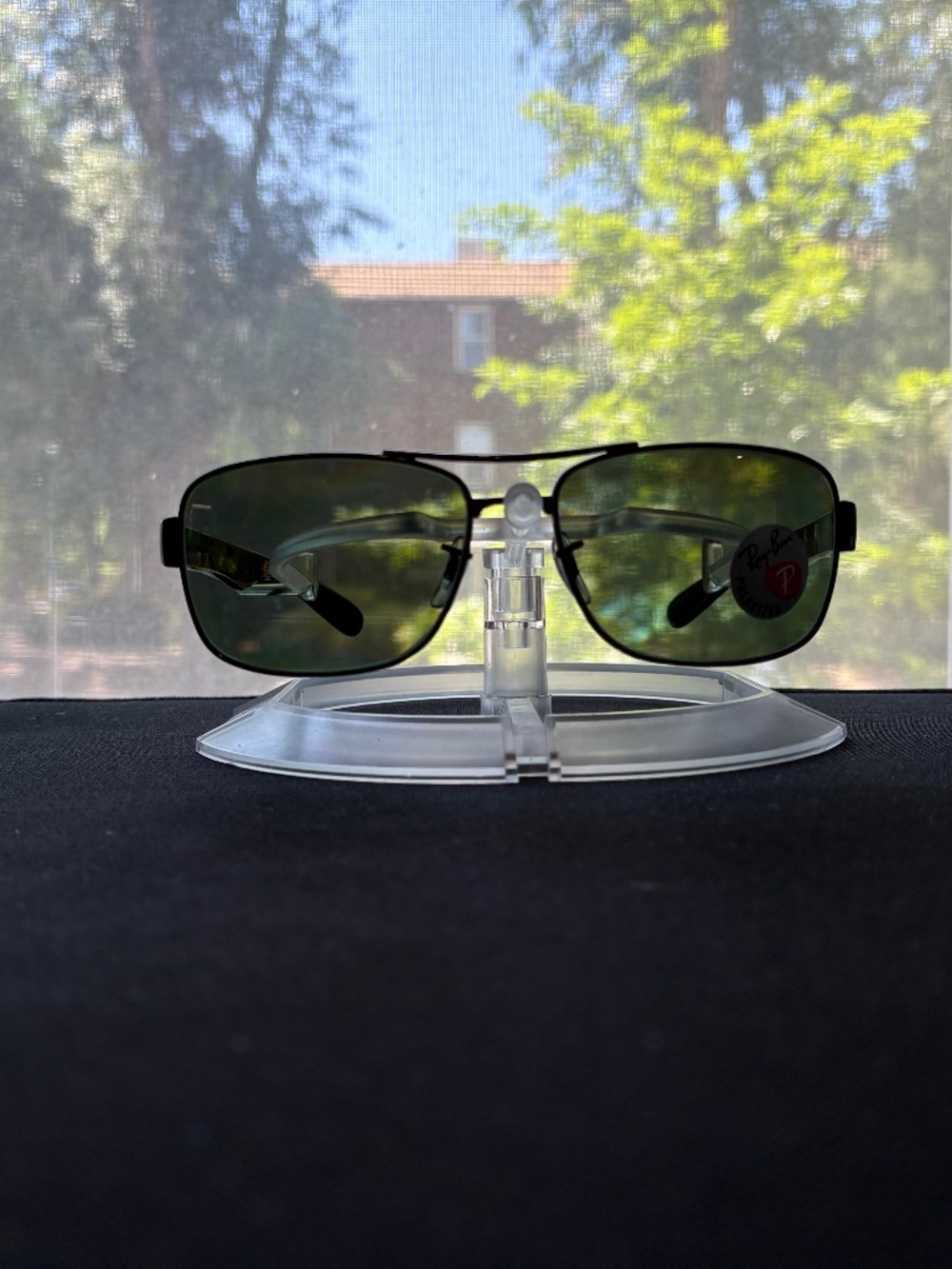Ray-Ban polarized sunglasses (RB3522). Black frame/green lenses